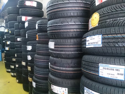stacks of new car tires